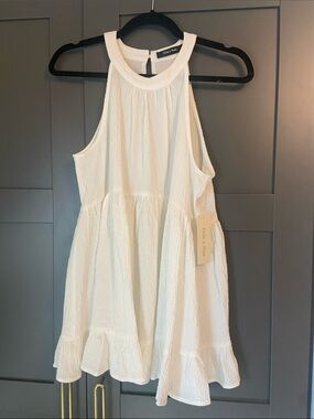 Ivory Sleeveless Ruffle-Hem Halter Tank
